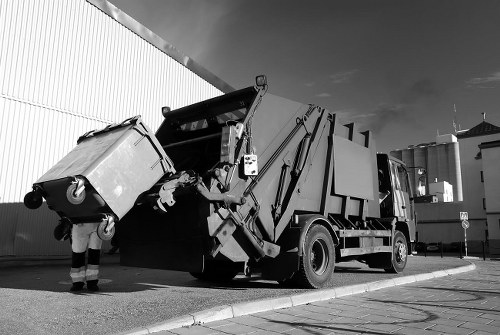 Professional house clearance team working in a North London home