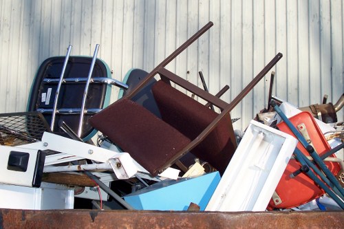 Waste collection trucks in North London streets